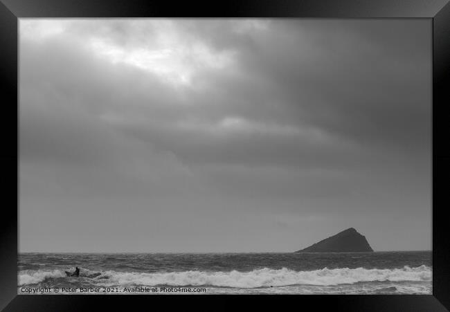 Individual surfer in Wembury Bay with the Great Mew Stone Framed Print by Peter Barber