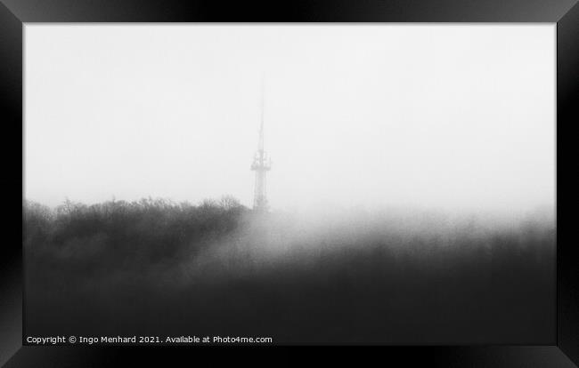 Mystic tower hidden in the woods behind the upcoming fog  Framed Print by Ingo Menhard