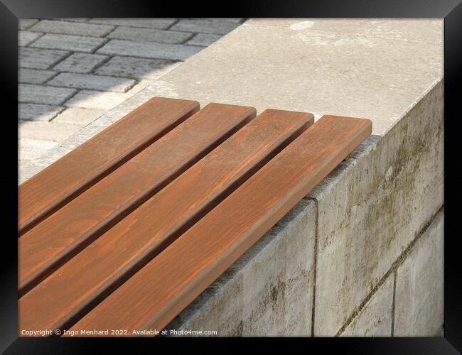 A part of a wooden bench in the park Framed Print by Ingo Menhard