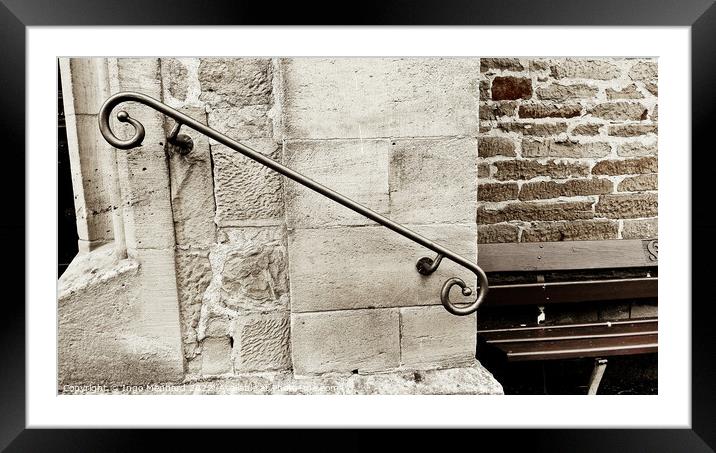 Closeup shot of a decorative metal rail on an old stone wall - perfect for background Framed Mounted Print by Ingo Menhard