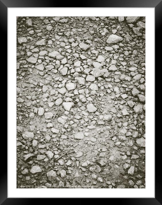 Vertical shot of the ground with tiny rocks Framed Mounted Print by Ingo Menhard