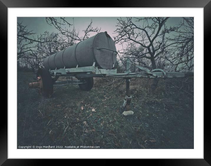 Old watering tank in an autumn park Framed Mounted Print by Ingo Menhard