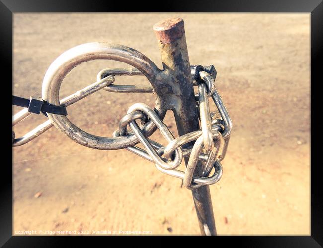 A selective focus shot of a chain on a pole Framed Print by Ingo Menhard