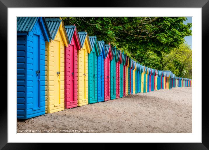 Brightly coloured beach huts at Llanbedrog, Wales. Framed Mounted Print by Alan Taylor
