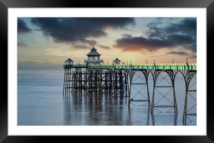 Clevedon Pier with a Moody Sunset Sky Framed Mounted Print by Tracey Turner