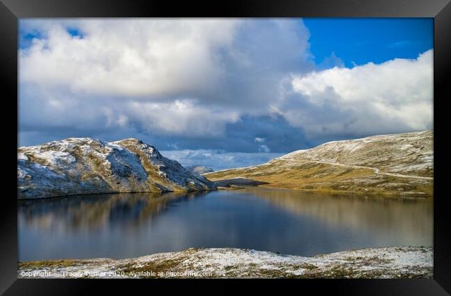 Snowy lake Framed Print by Tracey Turner