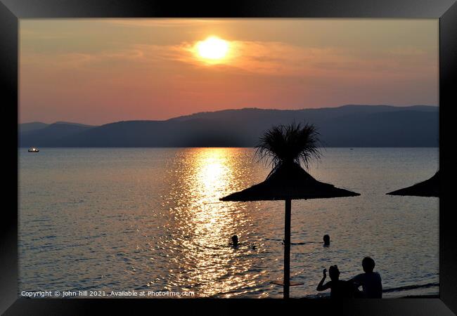 Sunset at Agia Eleni beach on  Skiathos in Greece. Framed Print by john hill