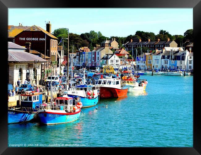 Fishing fleet at Weymouth in Dorset. Framed Print by john hill