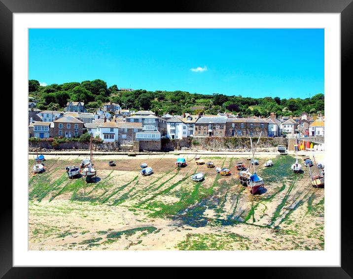 Mousehole at low tide in Cornwall. Framed Mounted Print by john hill