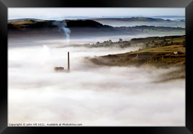 Chimney in the mist. Framed Print by john hill