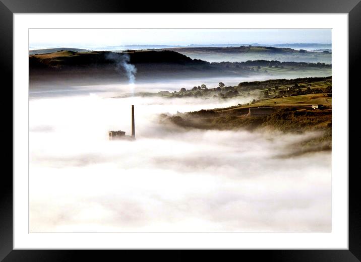 Chimney in the mist. Framed Mounted Print by john hill