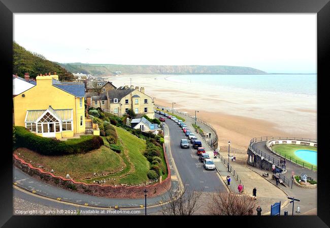 Seafront and Brigg at Filey, North Yorkshire, UK. Framed Print by john hill