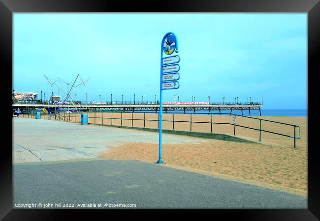 Skegness signs and pier. Framed Print by john hill