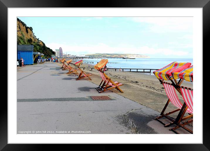 Empty deck chairs, Sandown, Isle of Wight, UK. Framed Mounted Print by john hill