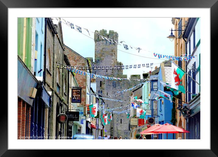 Flags and bunting, Caernarfon, North Wales, UK. Framed Mounted Print by john hill
