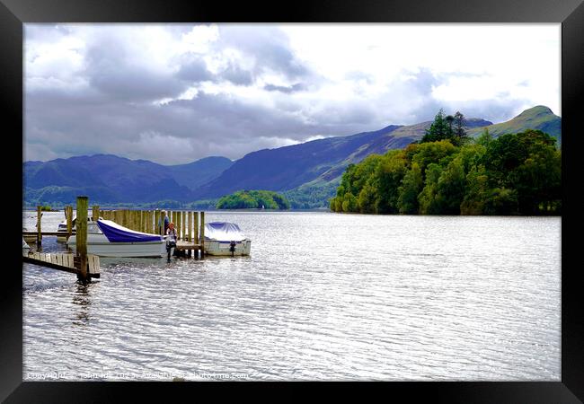 Dramatic Storm Clouds Engulfing Derwentwater Lake Framed Print by john hill