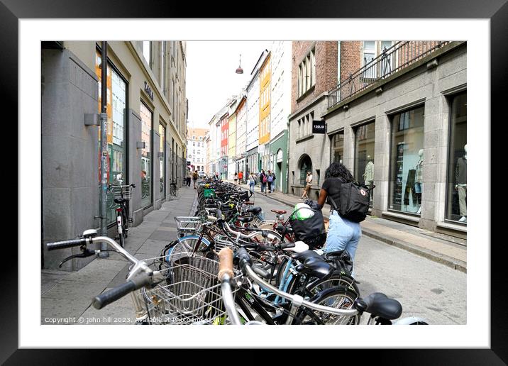 Back street bicycle Parking Copenhagen Denmark Framed Mounted Print by john hill