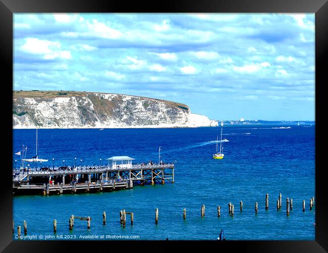 Echoes of Time: Swanage's Historic & Modern Piers Framed Print by john hill