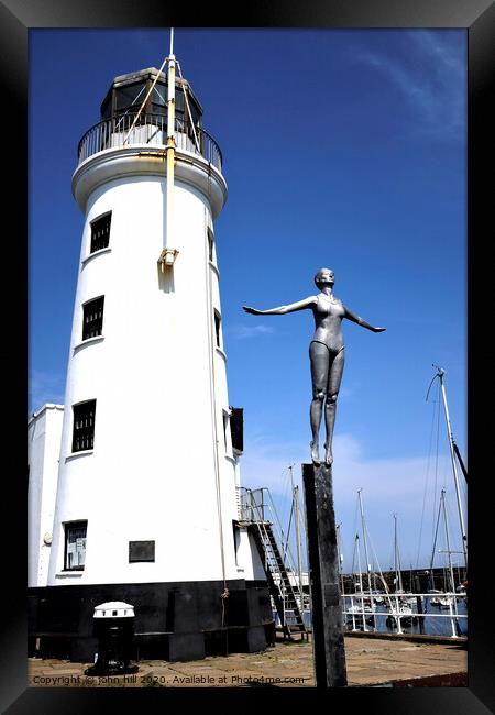 Harbour lighthouse and bathing belle statue at Scarborough. Framed Print by john hill