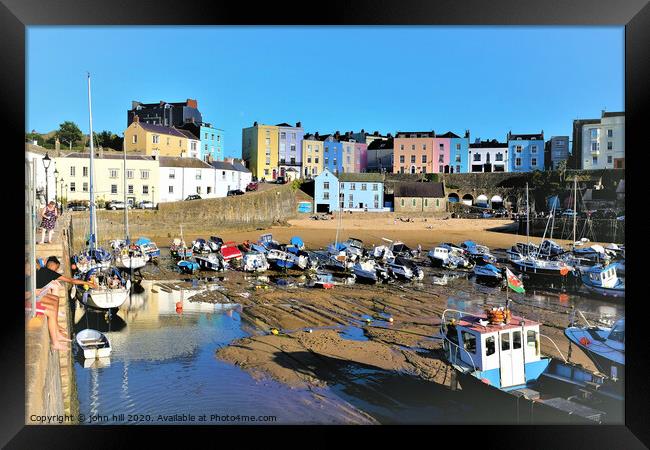 The beautiful colorful harbour of Tenby Wales at low tide. Framed Print by john hill