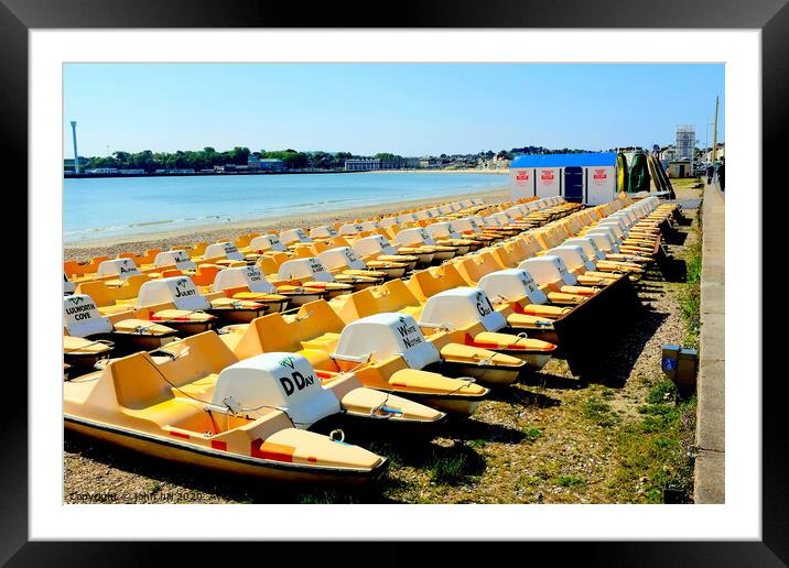 Pedalos on the beach at Weymouth in Dorset. Framed Mounted Print by john hill