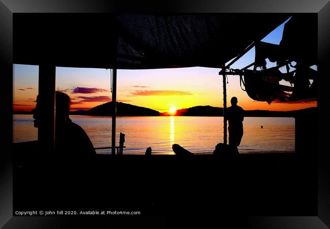 Sunset at beach bar on Tsougrias island in Greece. Framed Print by john hill
