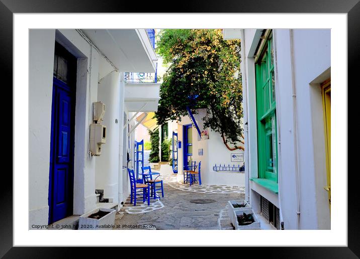 Back street in Skiathos town Greece. Framed Mounted Print by john hill