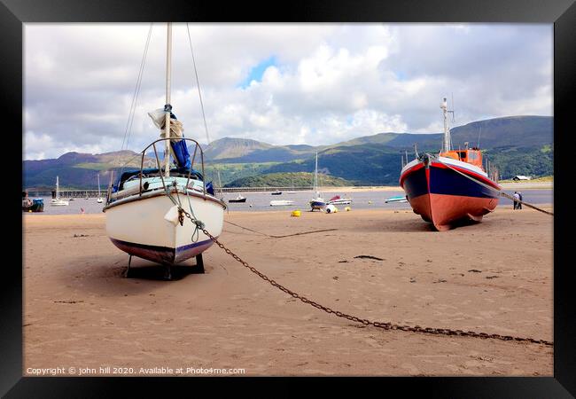 Beached boats  and mountains at Barmouth in Wales. Framed Print by john hill