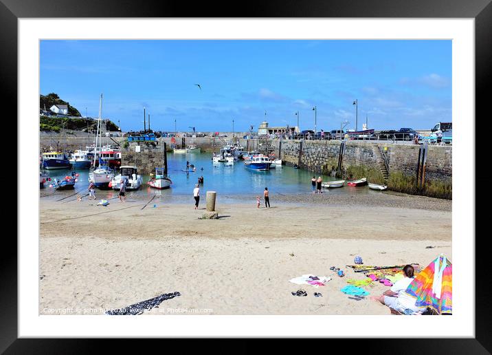 Harbour at low tide at Newquay in Cornwall. Framed Mounted Print by john hill