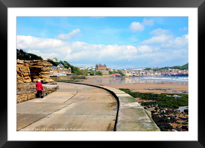 Walking the promenade towards Scarborough in Yorkshire. Framed Mounted Print by john hill