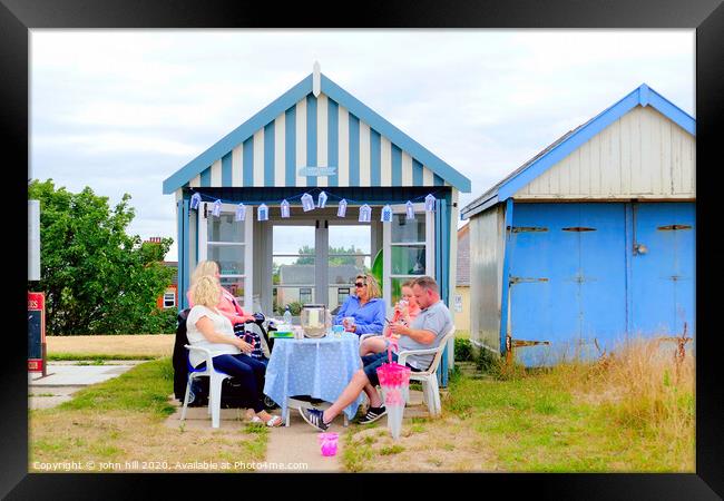 Beach hut tea party on the promenade at Sutton on Sea in Lincolnshire. Framed Print by john hill