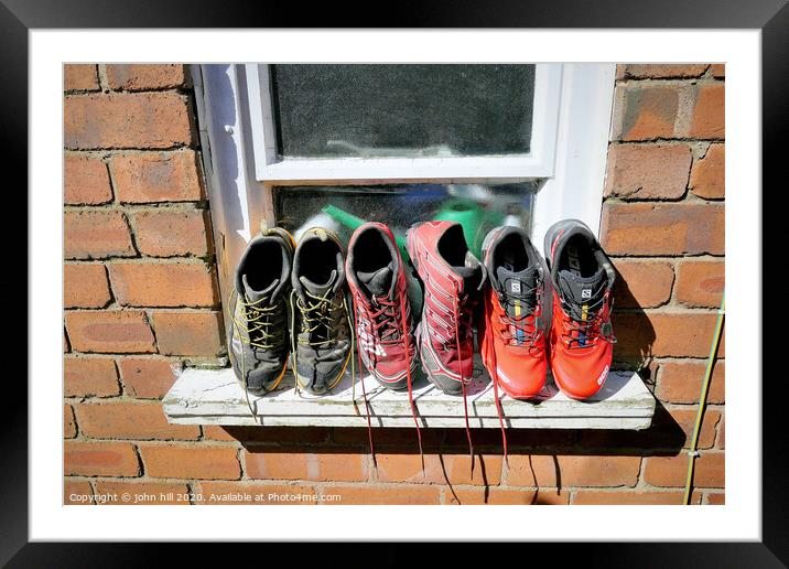 Washed trainers left to dry in the sunshine. Framed Mounted Print by john hill