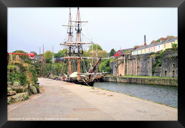Tall ships moored in Harbour at Charlestown in Cornwall. Framed Print by john hill