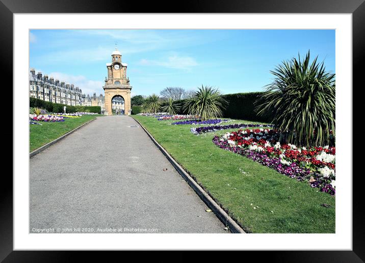 The Holbeck clock tower and South cliff gardens at Scarborough in Yorkshire.  Framed Mounted Print by john hill