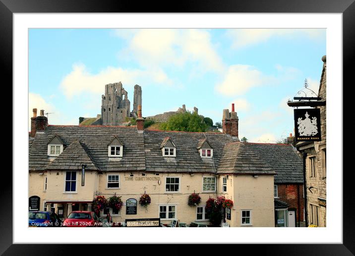 Corfe Castle from the town square in Dorset. Framed Mounted Print by john hill