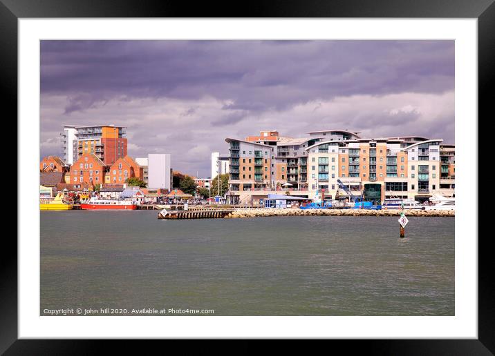 The quayside taken from a ferry at Poole harbour in Dorset Framed Mounted Print by john hill