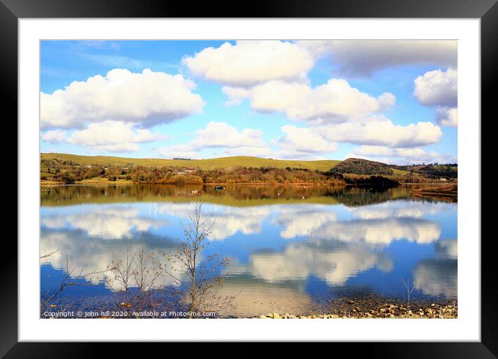 Cloud reflections in Carsington Water in Derbyshire. Framed Mounted Print by john hill