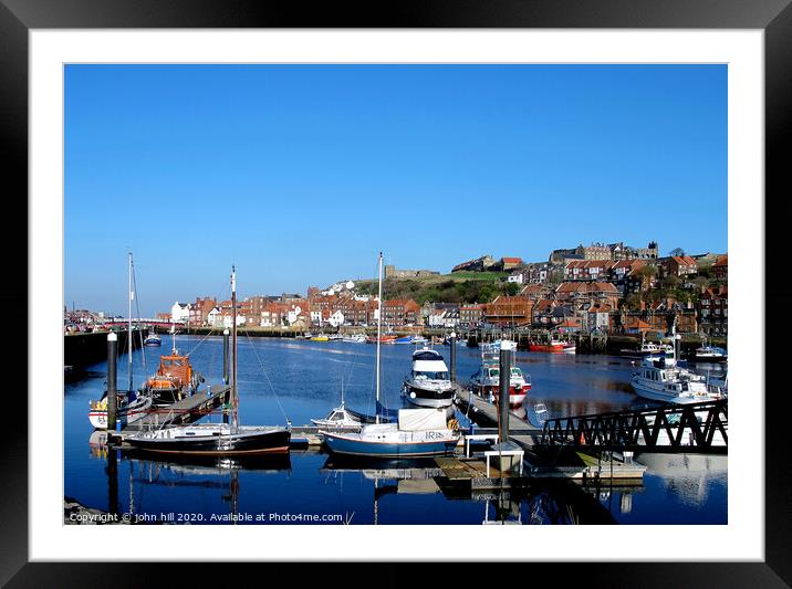 The harbour in November at Whitby in Yorkshire. Framed Mounted Print by john hill