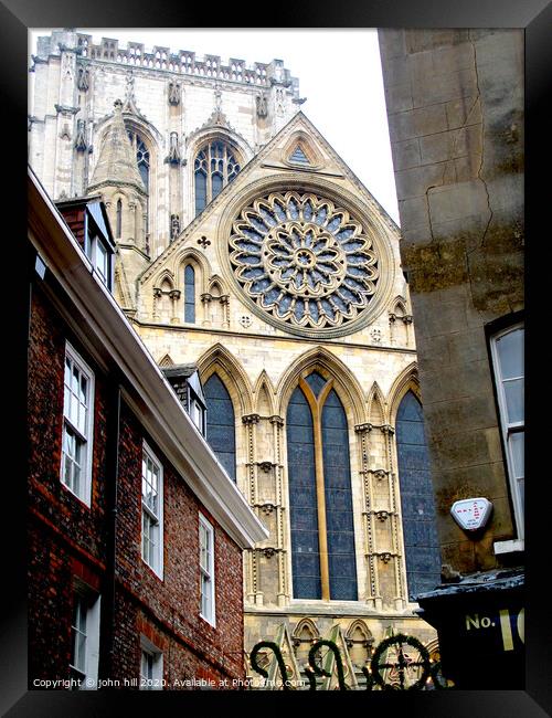 York Minster rose window and tower at York in Yorkshire. Framed Print by john hill