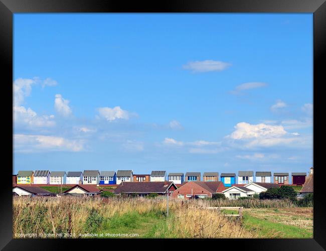 The backs of beach huts at Sandilands in Lincolnshire Framed Print by john hill