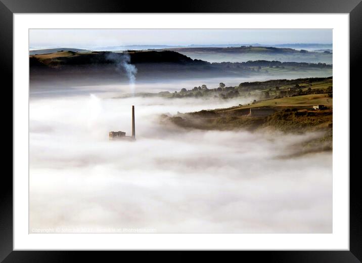 Chimney in the mist. Framed Mounted Print by john hill