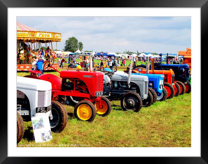 Various tractors at Country Show. Framed Mounted Print by john hill