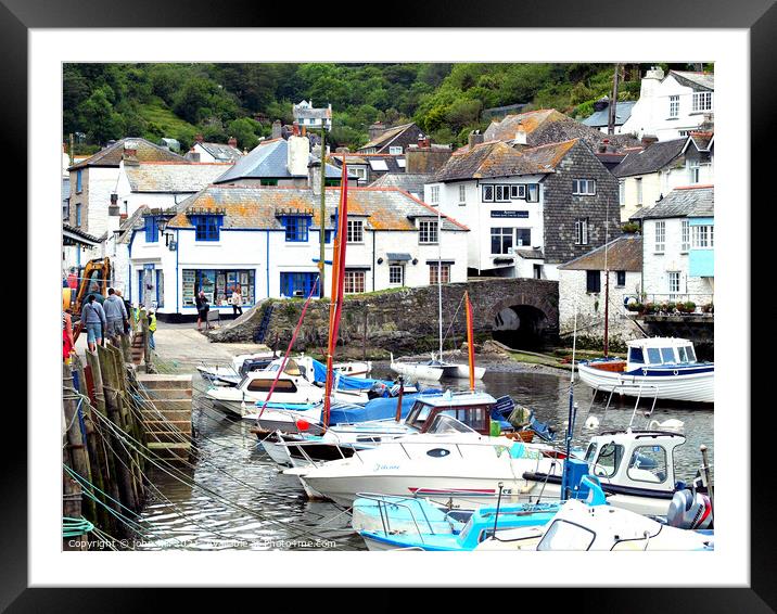 Harbour and town at Polperro in Cornwall. Framed Mounted Print by john hill