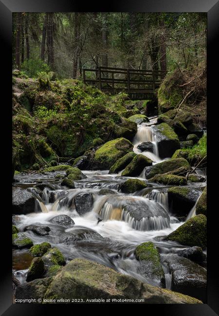 Waterfall under the bridge Framed Print by louise wilson