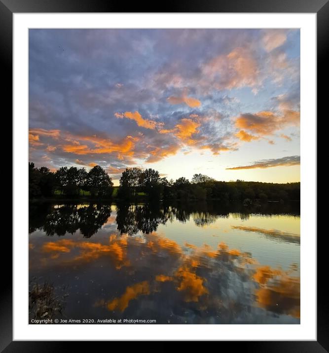 Sunset over the reservoir  Framed Mounted Print by Joe Ames