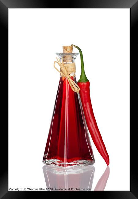 Bottle Chili Oil and Chili Pepper with real reflection Framed Print by Thomas Klee