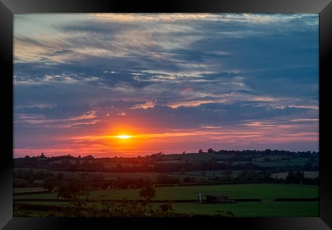 Sunset over Staverton Fields Framed Print by Helkoryo Photography