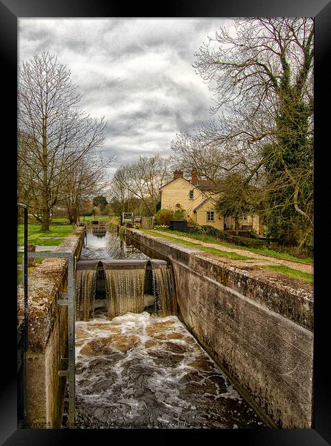 A view across a lock at Dedham, Suffolk, UK Framed Print by Peter Bolton