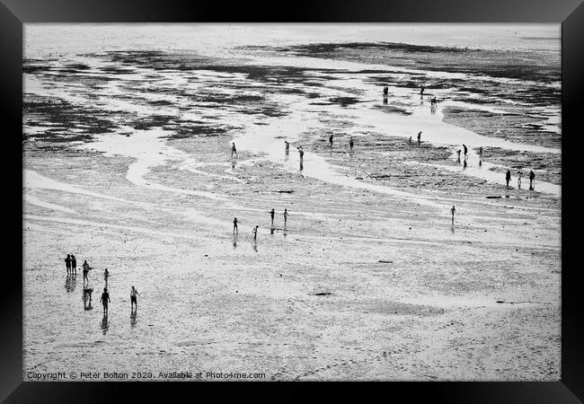 View of beach shot from above with people forming an abstract design. Framed Print by Peter Bolton