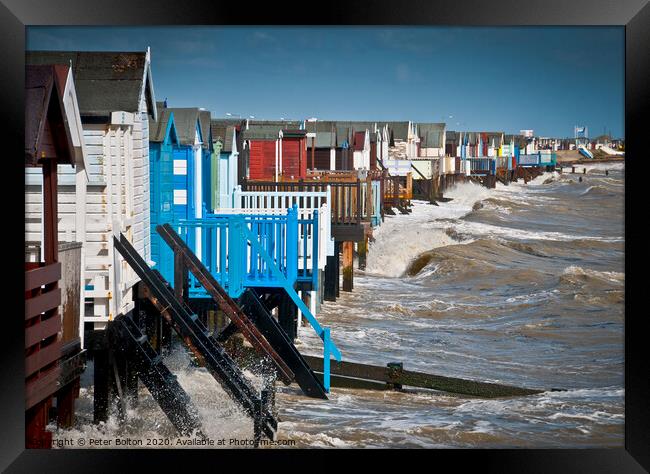 High tide at Thorpe Bay with beach huts. Framed Print by Peter Bolton